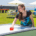 Company Picnic Activities: Woman Playing Air Hockey Picnic Activity at inVia's Staff Cookout near LA