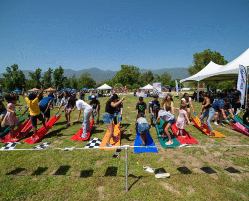 Guests Playing The Magic Carpet Ride Field Game at San Bernardino County's Employee Appreciation Picnic in Glen Helen Regional Park
