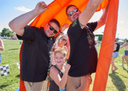 Team Playing Human Sprocket Field Game at Sheriff's Association Company Picnic